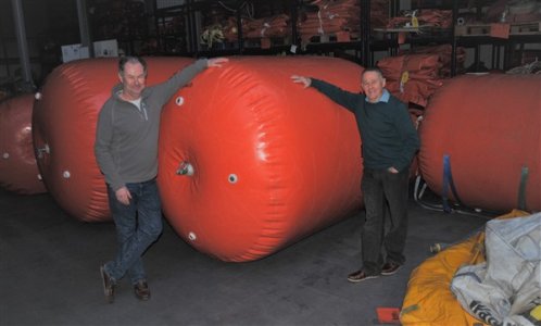 Jeremy & Howard with new purchase (600 x 362).jpg